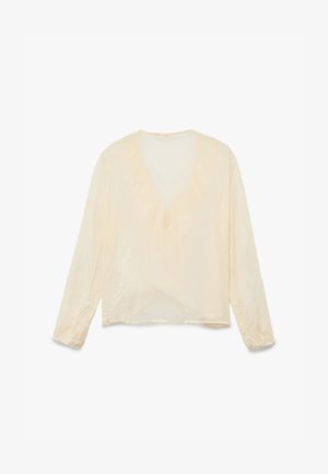 Lyscreme langærmet bluse med V-hals, afslappet pasform, blød tekstur og rynkede detaljer ved håndleddene. Glat, let materiale.