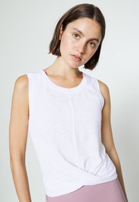 Athleta BREEZY TWIST FRONT CROP TANK - Top - bright white