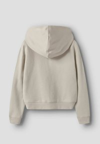 Beežikas lühendatud kapuutsiga pusa, millel on suur kapuuts, soonilised varrukaotsad ja alumine serv. Valmistatud pehmest materjalist, minimalistliku ja puhta disainiga, ilma nähtavate logodeta.