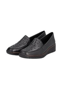 Scarpe slip-on nere in pelle con accenti di borchie sulla tomaia, dotate di suola a zeppa per maggiore altezza e comfort.