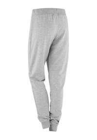 Graue Sweatpants mit schmaler Passform. Elastischer Bund und Bündchen, glatte Textur, keine sichtbaren Muster oder Akzente. Rückansicht.