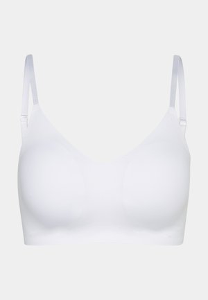 Seno bianco con coppe morbide e spalline sottili regolabili. Texture liscia, design senza cuciture e uno stile minimalista. Nessun applicazione o motivo.