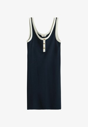 Vestido sin mangas azul marino con ribete blanco alrededor del cuello y las sisas, con una tapeta blanca con tres botones.