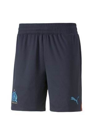 Mørkeblå sportsshorts med elastisk talje, med lyseblåt Puma-logo på højre side og en blå og guldfarvet emblemer på venstre ben.