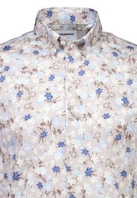 Beige button-up shirt with a collar, featuring a floral pattern in blue, white, and brown shades.
