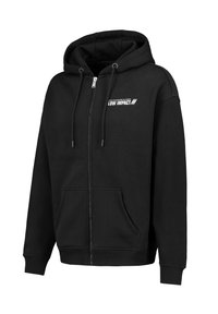 Black zip-up hoodie made of cotton blend fabric, featuring a front kangaroo pocket, drawstring hood, and white "LOW IMPACT" text detail.