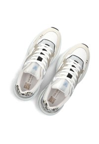 White athletic sneakers with mesh and leather upper, gray accents, thick translucent sole, and QR code on the tongue. Textured details on the heel.