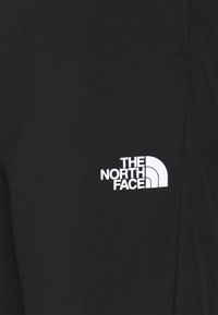 The North Face Träningsbyxor - black