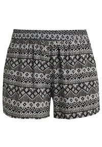 Černo-bílé vzorované šortky s elastickým pasem. Obsahují geometrické vzory a různé textury po celé látce.
