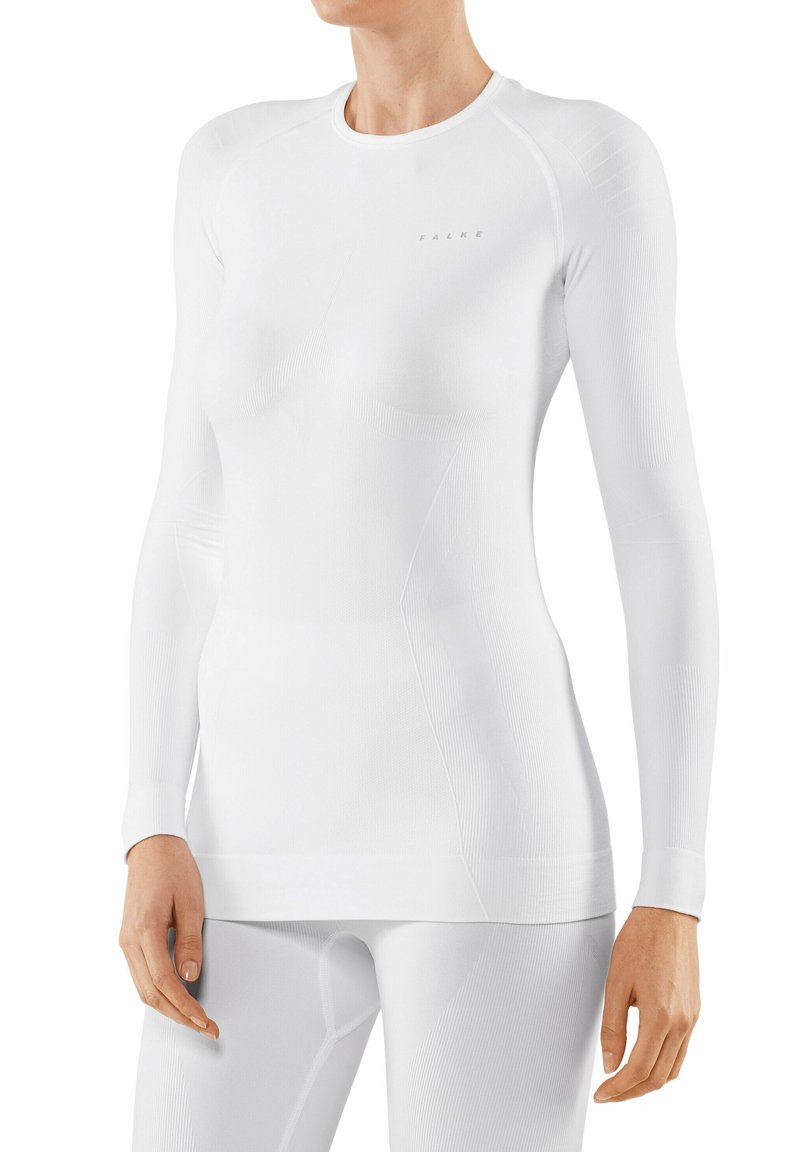 Top bianco a maniche lunghe con design aderente, texture a coste, scollo rotondo e logo sottile. Realizzato in un materiale liscio ed elastico.