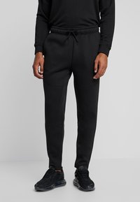 Urban Classics - CUT AND SEW PANTS - Tracksuit bottoms - black Thumbnail Image 1