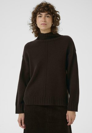 Maglione a collo alto marrone scuro in morbido filato, con polsini e orlo a coste, dalla vestibilità rilassata e con delicati dettagli di cuciture verticali.