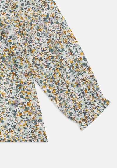 Blusa a maniche lunghe in tessuto leggero con un motivo floreale multicolore e dettagli in verde, giallo e viola; polsini arricciati.