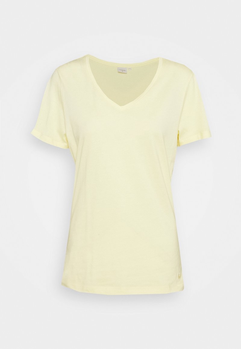 Lichtgeel katoenen T-shirt met V-hals, korte mouwen en een losse pasvorm. Subtiele stikseldetails nabij de zoom. Geen patronen of accenten.