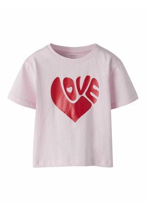 Light pink short-sleeve t-shirt with a large red heart design incorporating the word "LOVE" across the chest.