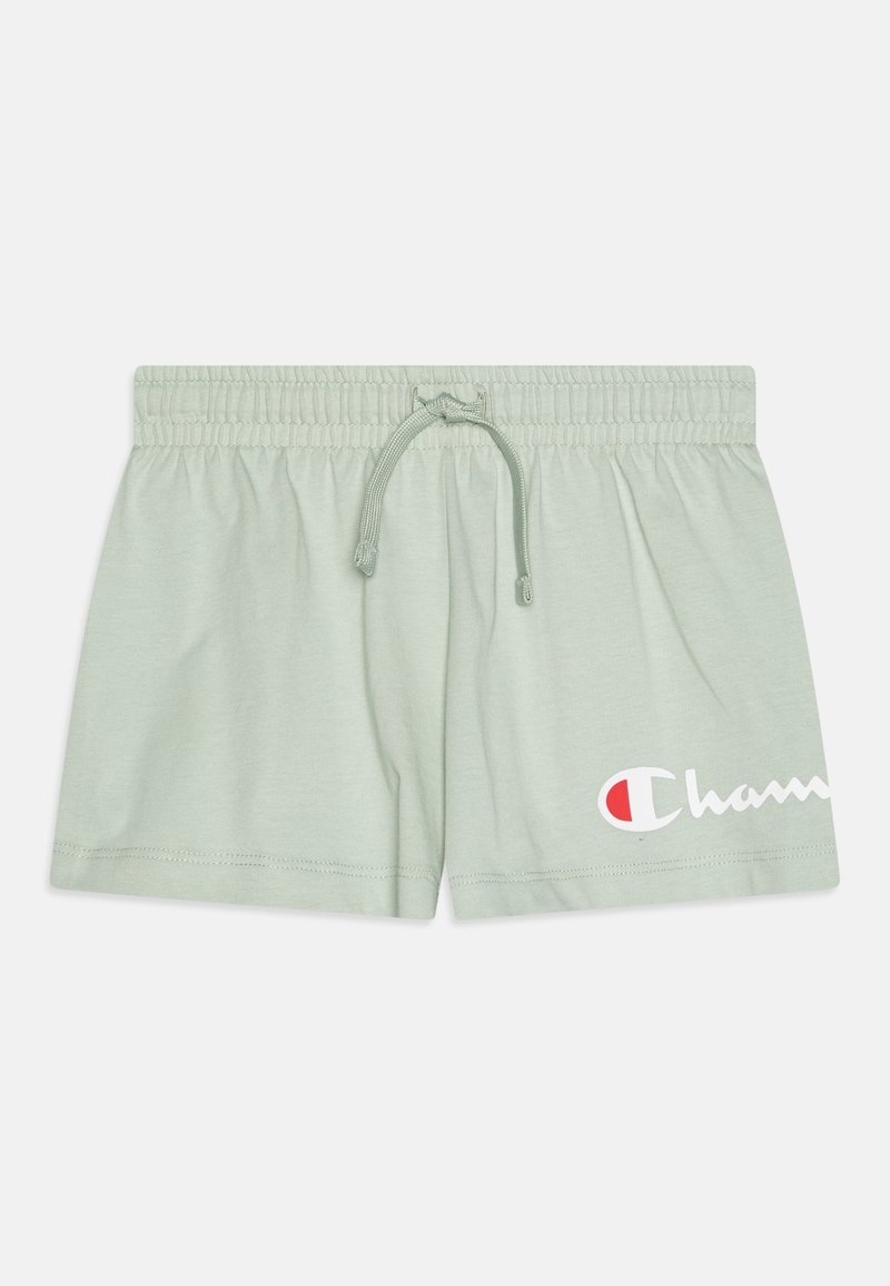 Shorts vert clair à taille élastique avec cordon et logo Champion partiel blanc et rouge sur la partie inférieure de la jambe droite.