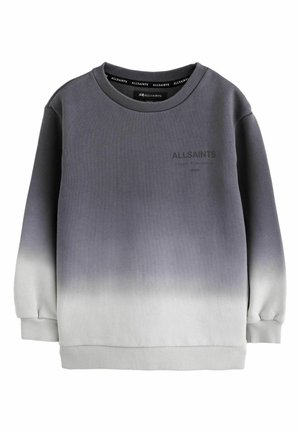 Sweatshirt gris avec un dégradé du gris foncé au gris clair. Doté d'un col rond, de poignets côtelés et d'un petit logo sur le devant.