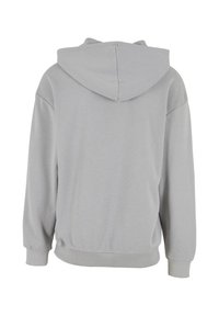 Light gray hooded sweatshirt with a relaxed fit, ribbed cuffs, and hem. Soft fabric and a simple design, emphasizing comfort and utility.
