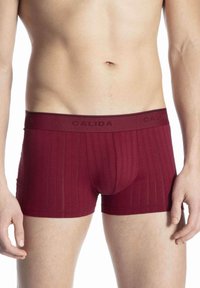 Unselected, rumba red