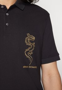 Armani Exchange Polo shirt - black