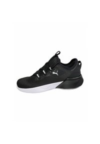 Scarpa sportiva nera con tomaia in rete, dettagli bianchi, chiusura con lacci e colletto imbottito. Dotata di una suola leggera e design flessibile.