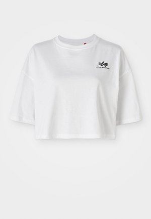 White cropped t-shirt made of cotton, featuring a round neckline, short sleeves, and a black logo accent on the left chest.