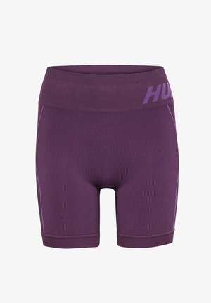 Lilla ribbede atletikshorts med en bred taljeelastik og kontrastsying. Mærket "HUGO" er vist langs taljeelastikken.