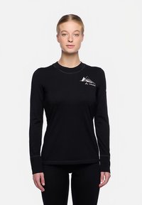 Schwarzes Langarmshirt mit rundem Halsausschnitt, aus glattem Material. Mit einem weißen Bergmotiv auf der Brust.