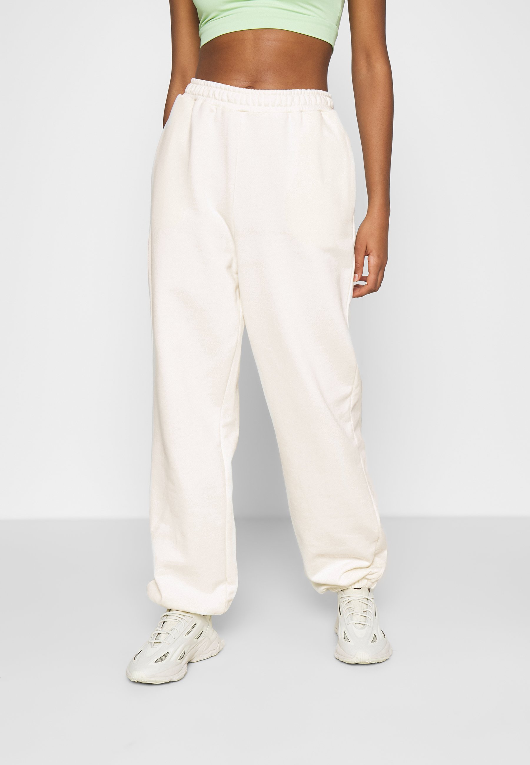 LOOSE FIT PANTS - Tracksuit bottoms 