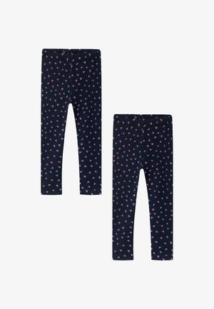 Leggings in dark navy fabric featuring a pattern of small pink hearts. Elastic waistband and tapered leg design. Two pairs shown.
