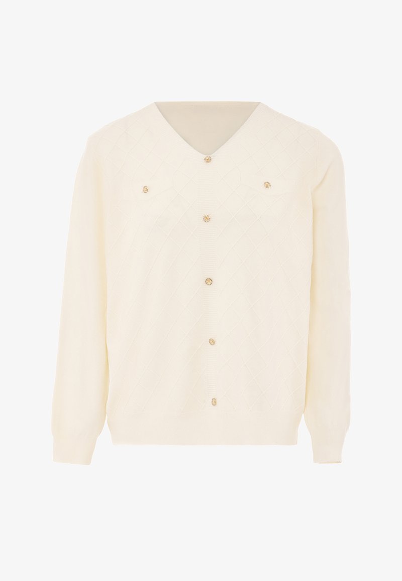 Krém színű, hosszú ujjú kardigán, gyémántos steppelésmintával és hat díszes aranygombbal az elején.