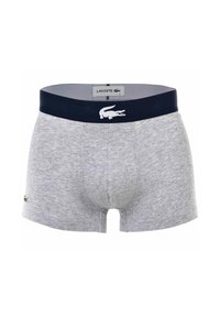 Boxer shorts en tissu extensible gris avec une taille navy arborant un logo Lacoste blanc. Le design comprend une coupe ajustée et une longueur intermédiaire.