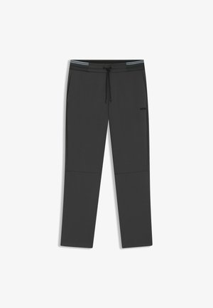 Dark gray athletic pants made from smooth fabric. Features an elastic waistband with drawstring and fitted cuffs. Subtle logo on the side.