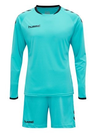 Turkise sportsuniform med langærmet trøje og shorts. Har sorte detaljer og logo, strukturerede ærmer og glat stof.