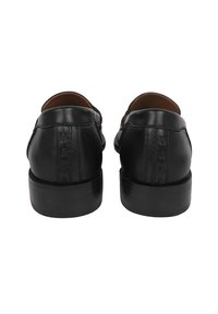 Scarpe in pelle nera con finitura liscia, punta rotonda, tacco basso e marchio impresso sul tallone. Interno foderato in marrone.