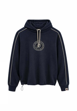 Sudadera con capucha azul marino con cordones crema, ribetes crema en las mangas y logo circular con texto "Sweet Pants Since 1982" en el pecho.