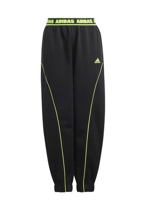 Pantalones de chándal negros Adidas con ribete amarillo neón, cintura elástica con el logo repetido de Adidas y puños elásticos en los tobillos.