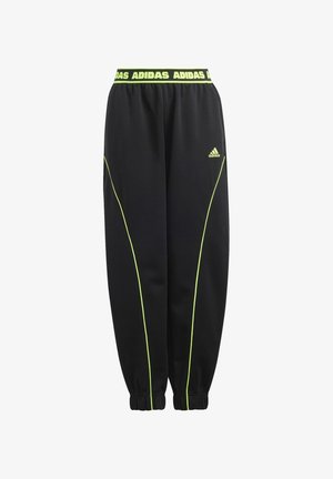 Sorte Adidas træningsbukser med neon gul piping, elastisk talje med gentaget Adidas-logo og elastiske manchetter ved anklerne.