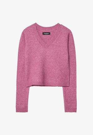 Maglione rosa corto con scollo a V, maniche lunghe e orlo a costine. Realizzato in morbido tessuto a maglia con una finitura leggermente testurizzata.