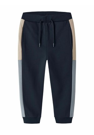 Pantaloni jogger blu navy con pannelli laterali beige e grigi, elastico in vita con cordino e polsini a coste alle caviglie.