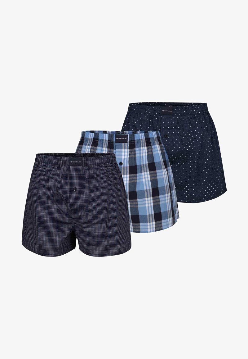 Ces boxers à carreaux bleus et marins, agrémentés de pois, présentent une taille élastique et une ouverture à boutons, confectionnés dans un tissu doux pour un maximum de confort.