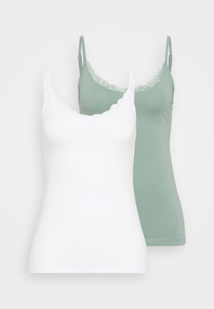 Two camisole tops: one white, one sage green. Both feature a lace-trimmed neckline and thin adjustable straps. Soft, smooth fabric.