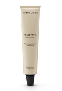 Beige squeeze tube with a black screw cap. Text on tube reads "Pickelpaste Spot Cream" and lists active ingredients like Niacinamide and Zinc Oxide.