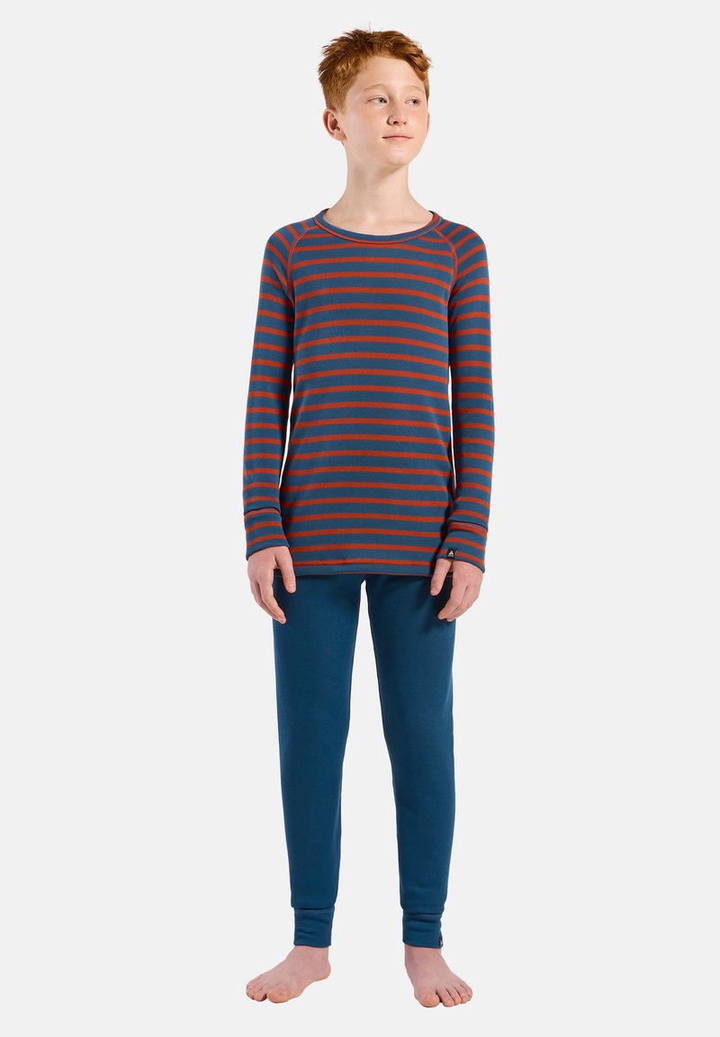 Long-sleeve striped pajama top in red and blue, paired with solid blue fitted pants. Made of soft, stretchy fabric.