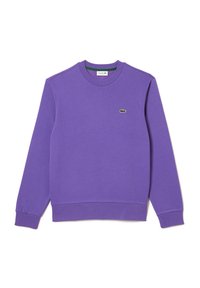 Sudadera morada hecha de un tejido suave, con cuello redondo, puños acanalados y un pequeño logo de cocodrilo verde en el pecho.