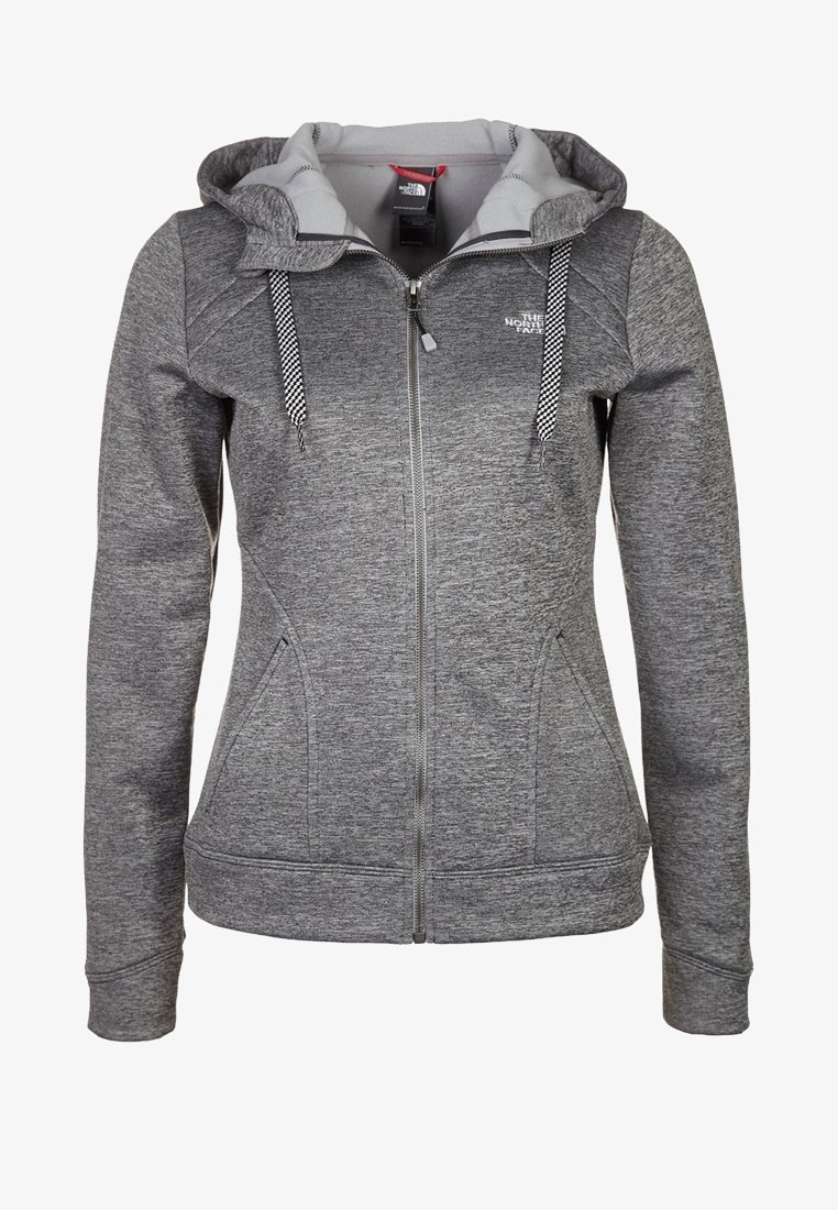 Šedá mikina na zip se kontrastní světle šedou kapucí, šňůrkami s kostkovaným vzorem a předními kapsami. Měkká, strukturovaná látka.