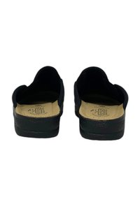Scarpe slip-on nere con solette imbottite, retro arrotondato e suole testurizzate. Solette di colore naturale con dettagli del marchio visibili all'interno.