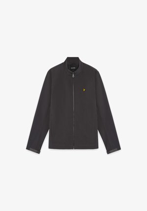 Fekete cipzáros kabát magas gallérral, hosszú ujjakkal és egy kis sárga hímzett madár logóval a bal mellkason.