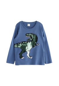 Langärmliges blaues Hemd mit einem grünen und weißen Dinosaurierdesign, das eine strukturierte Oberfläche aufweist. Rundhalsausschnitt und weicher Stoff.