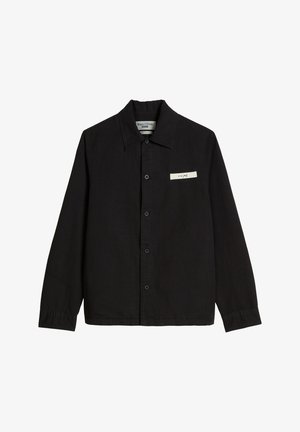 Black long-sleeve button-up shirt with collar, front patch featuring small text, and label inside collar reading Marc O'Polo Denim.